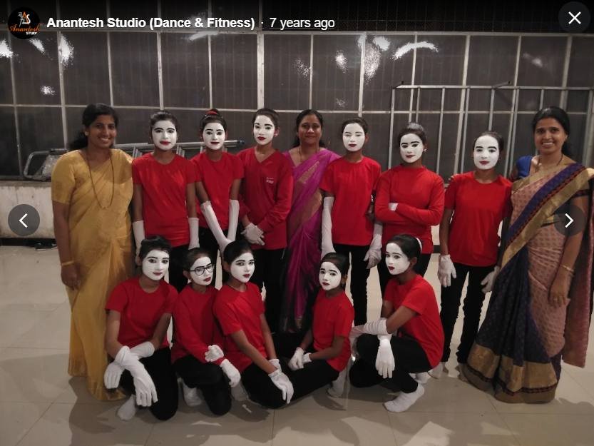 Mime performance group in red and white