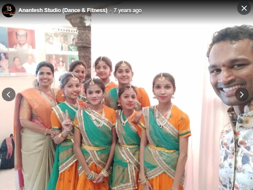 Anantesh Studio instructor with students in traditional dance costume